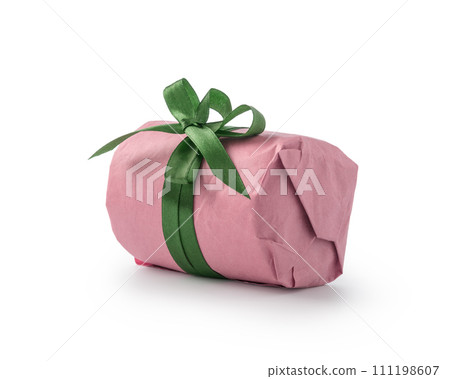 Present wrapped with purple paper with green ribbon bow isolated on white background 111198607