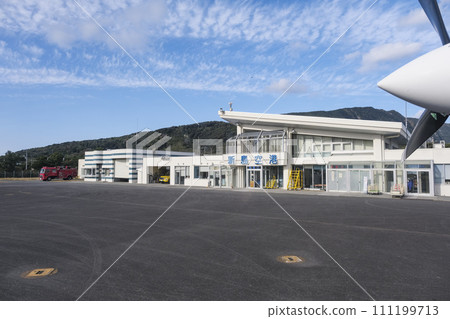 Niijima Airport terminal building seen from an airplane Niijima Airport terminal building seen from an airplane 111199713