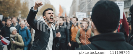 Man Expressing Anger at Protest, Crowd in Background, Strong Emotions Evident, Signs and Banners Indicating Large Gathering Man Expressing Anger at Protest, Crowd in Background, Strong Emotions Evident, Signs and Banners Indicating Large Gathering 111199795