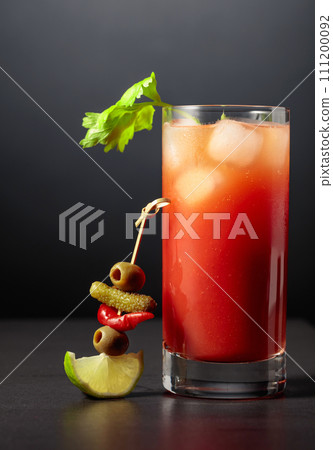 Cocktail Bloody Mary on a black background. Cocktail Bloody Mary on a black background. 111200092