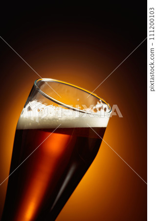 Beer in a tall glass. 111200103