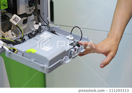 Man fitter assembling modern house gas boiler 111203313