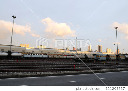 Railway station with railway tracks Railway station with railway tracks 111203337