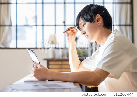 A man who studies and worries A man who studies and worries 111203444