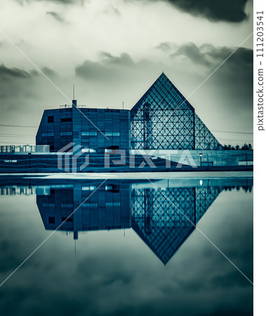 pyramid reflected in the water 111203541