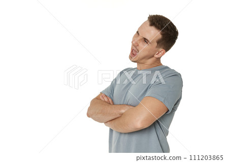 portrait of young happy man winking looking at the camera on white background 111203865