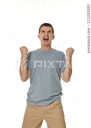 portrait of young man showing victory gesture on white background 111203883