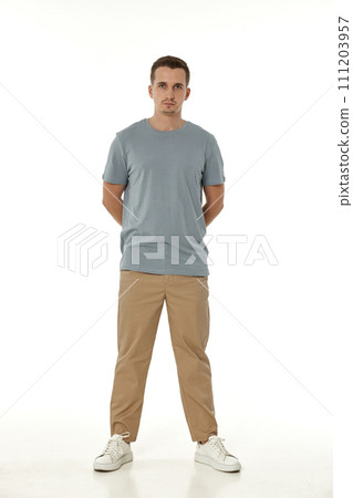 handsome young calm man on white background handsome young calm man on white background 111203957