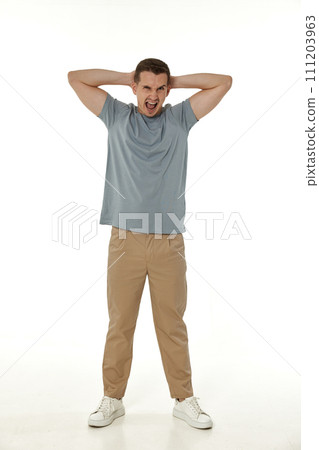 annoyed angry man shouting on white studio background annoyed angry man shouting on white studio background 111203963