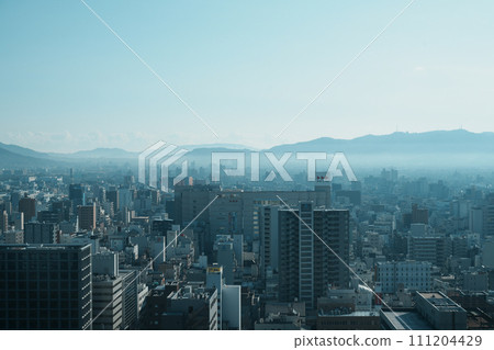 Takamatsu city area in the haze on a winter morning (view from Kagawa Prefectural Office) Takamatsu city area in the haze on a winter morning (view from Kagawa Prefectural Office) 111204429