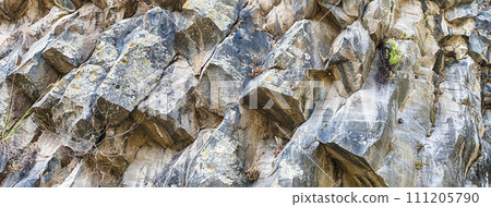 Texture of volcanic stones at the Alcantara Gorges, Sicily, Italy 111205790