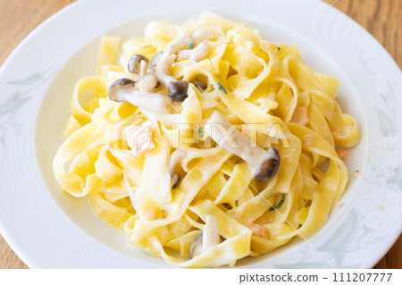 Tagliatelle with delicious salmon cream sauce Tagliatelle with delicious salmon cream sauce 111207777