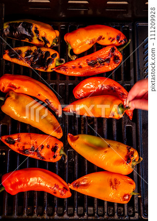 Red sweet kapia paprika on the grill 111209928