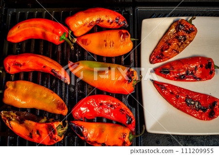 Red sweet kapia paprika on the grill 111209955