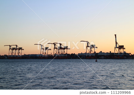 Gantry crane at Oi Container Wharf at dusk, Tokyo 111209966