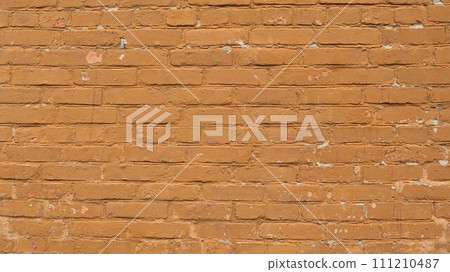 brick wall painted with brown paint with shabby texture and highlighted relief pattern as blank wallpaper background and graphic resource for design, fragment of old painted brickwork 111210487