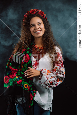Modern young woman in traditional ukrainian handkerchief. Ukraine, style, folk Modern young woman in traditional ukrainian handkerchief. Ukraine, style, folk 111211609