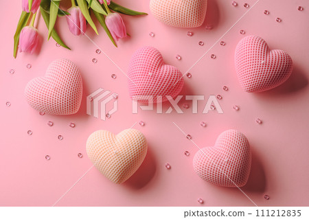 a set of soy handmade candles on a pink background with tulips, a beautiful gift and wish for lovers on Valentine's Day or Mother's Day a set of soy handmade candles on a pink background with tulips, a beautiful gift and wish for lovers on Valentine's Day or Mother's Day 111212835
