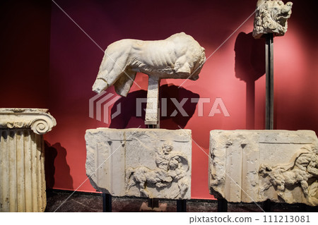 Parts of a lion statue and bas-reliefs with centaurs 111213081