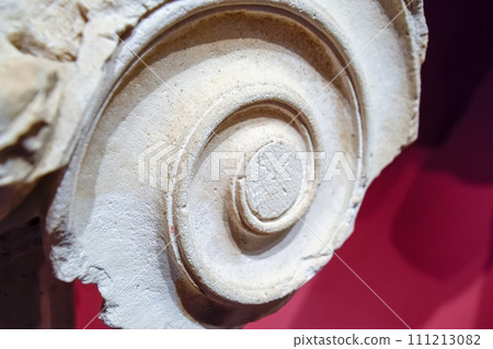 Curl, part of the ornament of antique bas relief on a marble slab. 111213082