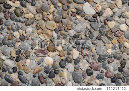 Background texture of the pavement of stone pellets Background texture of the pavement of stone pellets 111213432