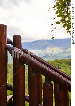 Wooden Railing Overlook and Forested Mountains Landscape 111214044