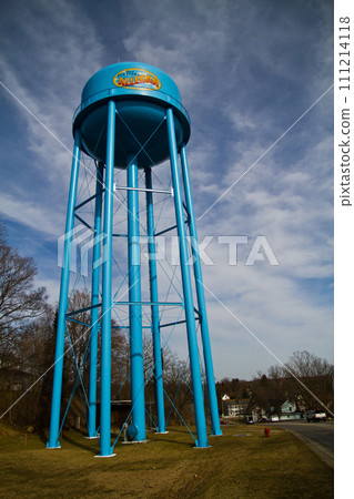 Blue Allegan Water Tower Against Dynamic Sky in Semi-Rural Community 111214118