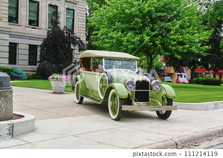 Vintage Green Convertible at Classical Building, Eye-Level View 111214119
