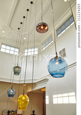 Modern Interior with Colorful Hanging Lights and Coffered Ceiling 111214203