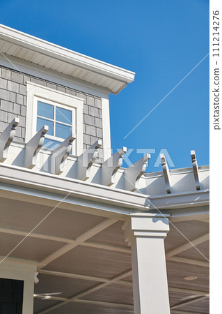 Modern Home Architecture with Pergola and Blue Sky Modern Home Architecture with Pergola and Blue Sky 111214276