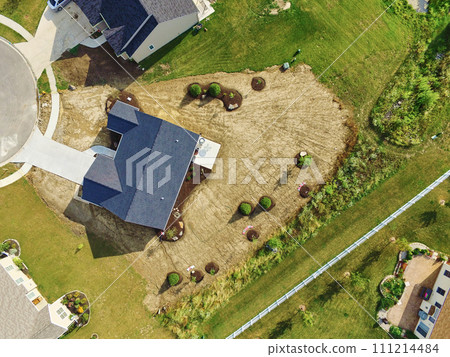 Aerial View of Suburban House with Unfinished Landscaping in Fort Wayne 111214484