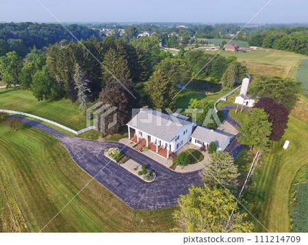 Aerial View of Countryside Estate with White Barn and Pond in Indiana 111214709