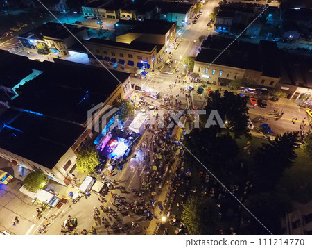 Aerial Nighttime Urban Event with Stage Lighting and Crowd in Indiana 111214770