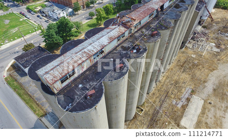 Aerial View of Abandoned Grain Silos and Factory in Decay Aerial View of Abandoned Grain Silos and Factory in Decay 111214771