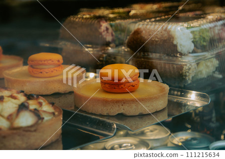 Variety of small desserts in the bakery 111215634