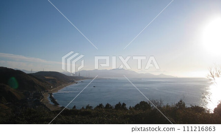 Looking down on the Sea of Japan from Cape Shiiya, the coastline of the cape, and Mt. Yoneyama in the back 111216863