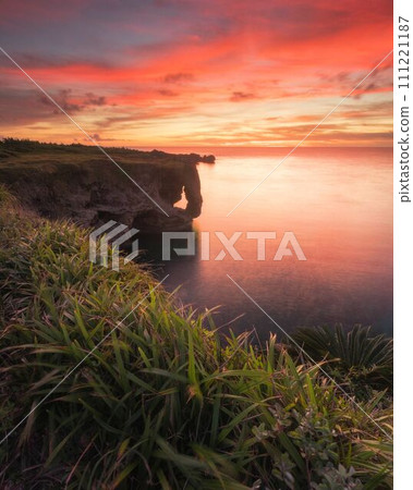 Sunset seen from Cape Manza, Onna Village, Okinawa Prefecture Sunset seen from Cape Manza, Onna Village, Okinawa Prefecture 111221187