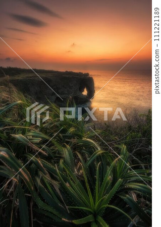 Sunset seen from Cape Manza, Onna Village, Okinawa Prefecture Sunset seen from Cape Manza, Onna Village, Okinawa Prefecture 111221189