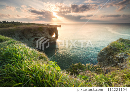 Sunset seen from Cape Manza, Onna Village, Okinawa Prefecture Sunset seen from Cape Manza, Onna Village, Okinawa Prefecture 111221194