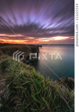 Sunset seen from Cape Manza, Onna Village, Okinawa Prefecture Sunset seen from Cape Manza, Onna Village, Okinawa Prefecture 111221314