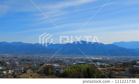 The snow-covered Mt. Fuji appears majestically on a clear autumn day 111221736