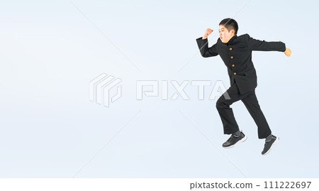 A male student wearing a jumping school uniform 111222697