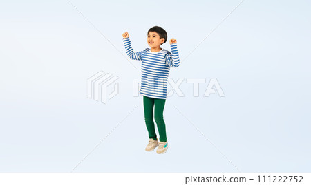 Boy jumping with a smile Boy jumping with a smile 111222752