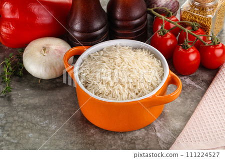 Raw delicous basmati rice heap Raw delicous basmati rice heap 111224527