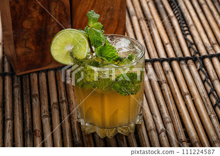 Mojito cocktail with lime and mint Mojito cocktail with lime and mint 111224587