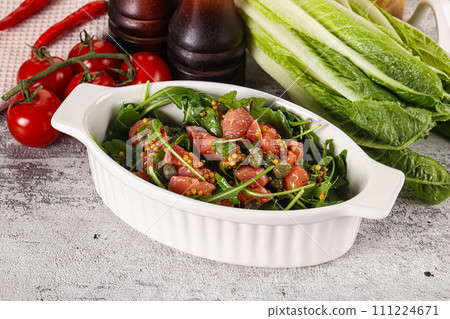 Salad with salmon and arugula 111224671
