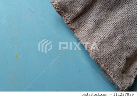 Hemp cloth bag on blue background Hemp cloth bag on blue background 111227959