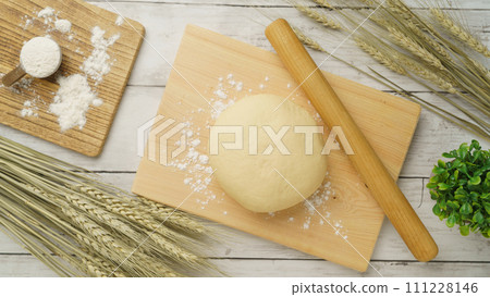 Dough making image | Dough, flour, and ears of wheat Dough making image | Dough, flour, and ears of wheat 111228146