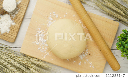 Dough making image | Dough, flour, and ears of wheat Dough making image | Dough, flour, and ears of wheat 111228147