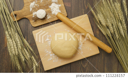 Dough making image | Dough, flour, and ears of wheat Dough making image | Dough, flour, and ears of wheat 111228157